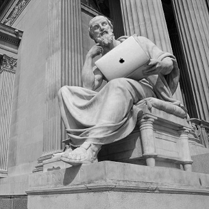 Aristotle as a statue on a macbook